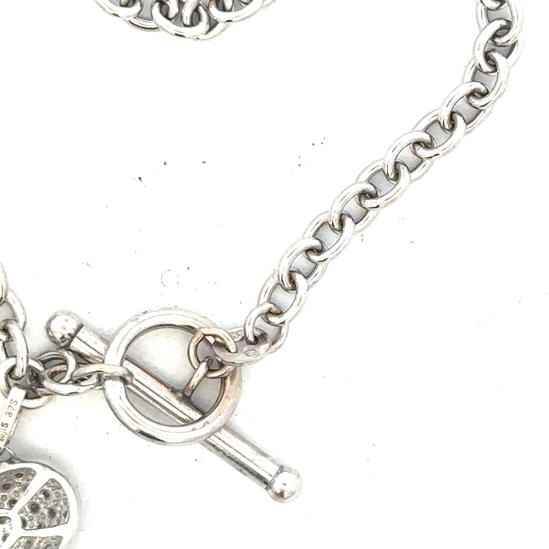 9ct white gold diamond bracelet featuring sparkling diamonds and a delicate design, weighs 5.4g, unbranded.