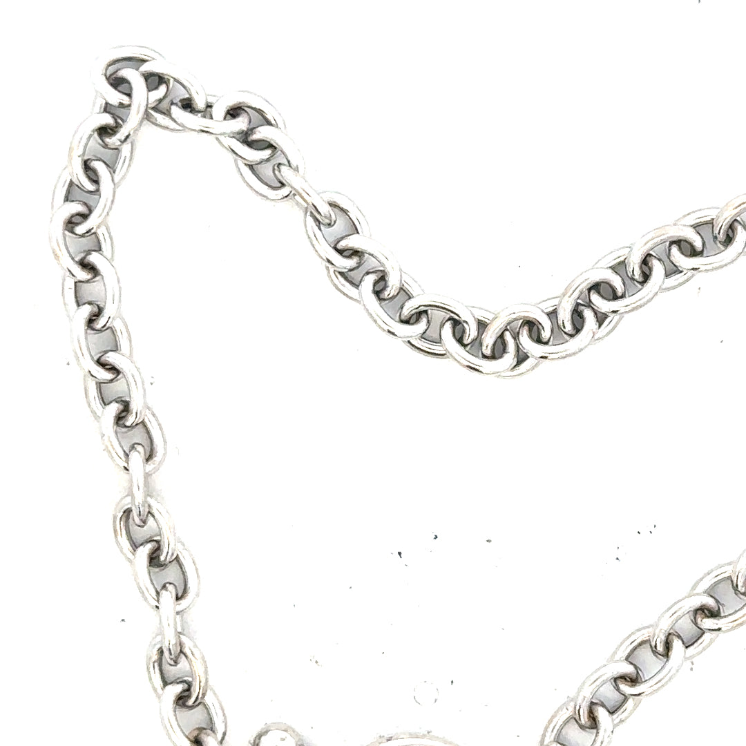 9ct white gold diamond bracelet with sparkling stones, weighs 5.4g, featuring a sleek, elegant design.