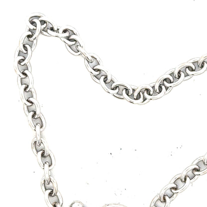 9ct white gold diamond bracelet with sparkling stones, weighs 5.4g, featuring a sleek, elegant design.