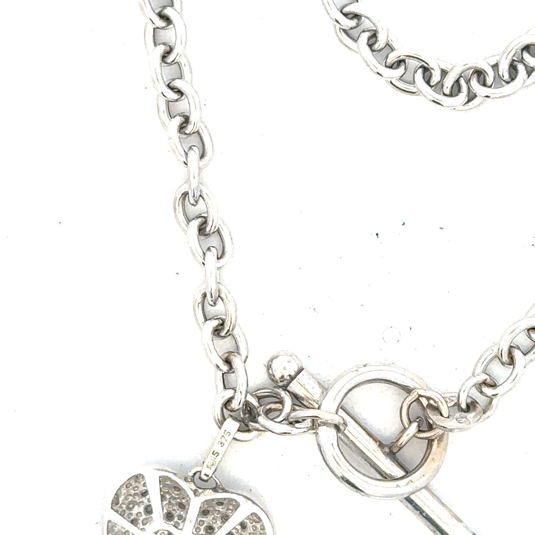 9ct white gold diamond bracelet with sparkling diamonds, weighing 5.4g, featuring a sleek and elegant design.