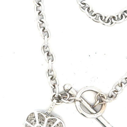 9ct white gold diamond bracelet with sparkling diamonds, weighing 5.4g, featuring a sleek and elegant design.