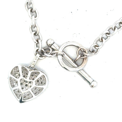9ct white gold diamond bracelet with sparkling diamonds, featuring a sleek design and weighing 5.4g.