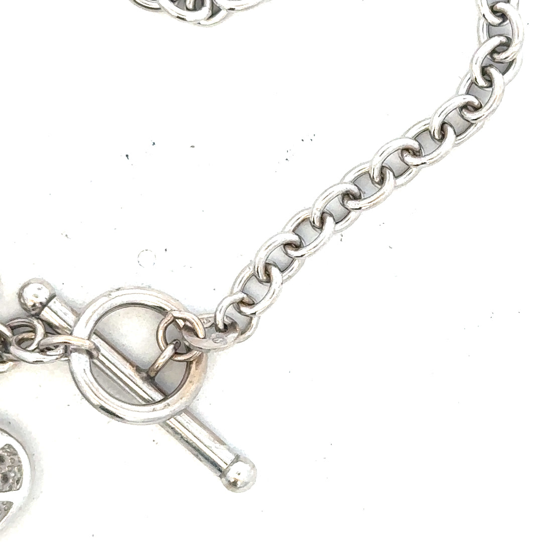 9ct white gold diamond bracelet with sparkling diamonds, weighing 5.4g, featuring a sleek, elegant design.