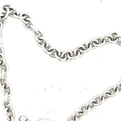 9ct white gold diamond bracelet featuring sparkling diamonds and a sleek design, weighing 5.4g.