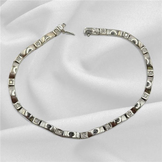 9ct white gold diamond bracelet with delicate design, 8 inches long, showcasing sparkling diamonds and fine craftsmanship.