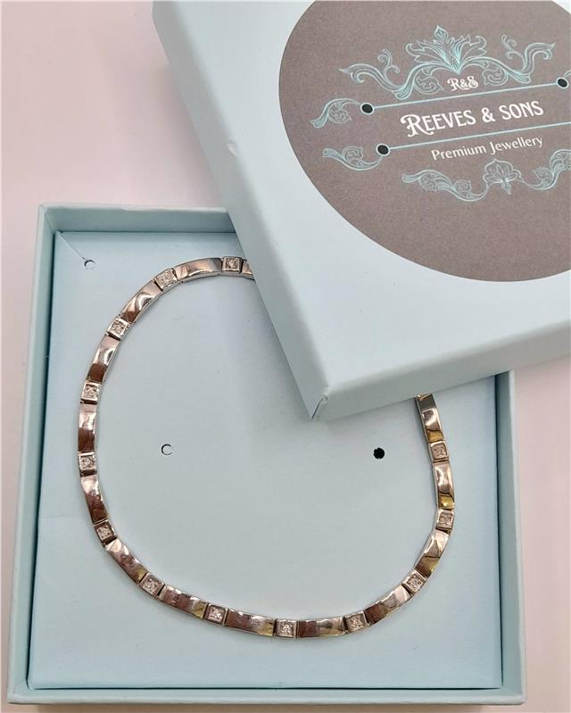 9ct white gold diamond bracelet, 8 inches long with sparkling diamonds, unbranded jewelry accessory on a plain background.