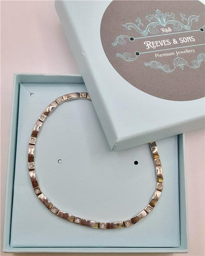 9ct white gold diamond bracelet, 8 inches long with sparkling diamonds, unbranded jewelry accessory on a plain background.