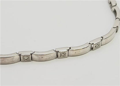 9ct white gold diamond bracelet with intricate design, weighs 8.6g, 8-inch length, unbranded jewelry accessory.