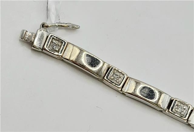 9ct white gold diamond bracelet, 8 inches long, featuring sparkling diamonds and a sleek design, unbranded jewelry accessory.
