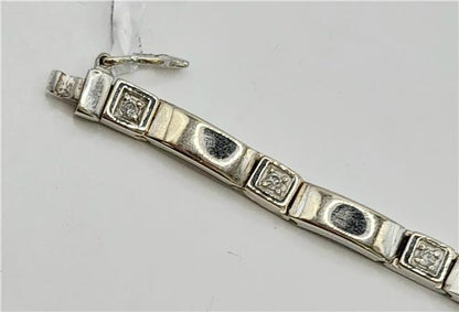 9ct white gold diamond bracelet, 8 inches long, featuring sparkling diamonds and a sleek design, unbranded jewelry accessory.