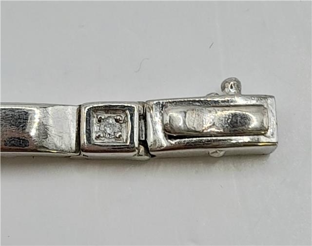 9ct white gold diamond bracelet, 8 inches long with sparkling diamonds, weighing 8.6 grams, unbranded jewelry accessory.