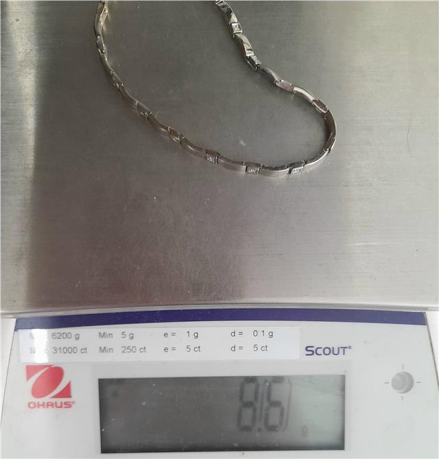 9ct white gold diamond bracelet, 8 inches, featuring sparkling diamonds and elegant design, unbranded jewelry accessory.