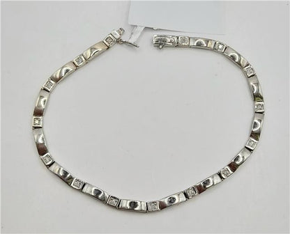 9ct white gold diamond bracelet, 8 inches, featuring sparkling diamonds and elegant design, weighs 8.6 grams.