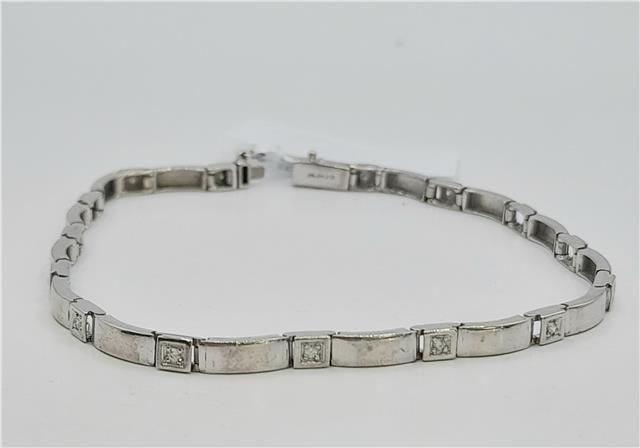 9ct white gold diamond bracelet, 8 inches, showcasing sparkling diamonds and elegant design in a close-up image.