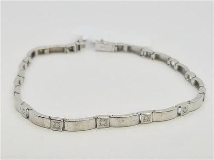 9ct white gold diamond bracelet, 8 inches, featuring sparkling diamonds and a delicate chain, unbranded jewelry accessory.