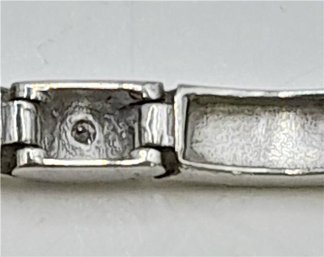 9ct white gold diamond bracelet with sparkling stones, 8 inches long, unbranded, elegant jewelry design.