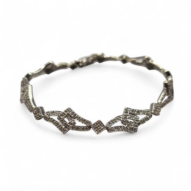 9ct white gold diamond bracelet with sparkling diamonds, featuring a delicate chain and elegant design.
