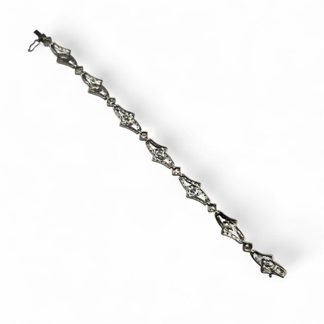 9ct white gold diamond bracelet featuring sparkling diamonds, elegant and stylish jewelry accessory.