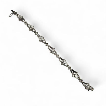 9ct white gold diamond bracelet featuring sparkling diamonds, elegant and stylish jewelry accessory.