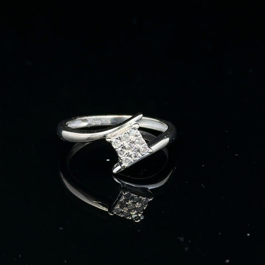 9ct white gold diamond cluster ring with 10-point diamond, showcasing a sparkling, elegant jewelry piece.