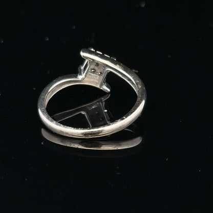 9ct white gold diamond cluster ring with a 10-point diamond, showcasing sparkling brilliance and elegant design.