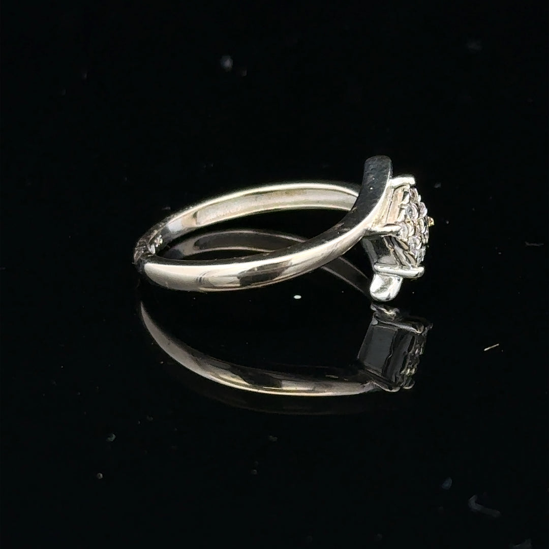 9ct white gold diamond cluster ring with 10-point diamond, showcasing a sparkling jewelry piece with intricate design.