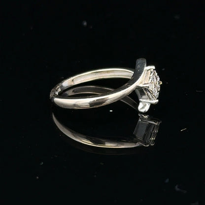 9ct white gold diamond cluster ring with 10-point diamond, showcasing a sparkling jewelry piece with intricate design.