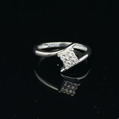 9ct white gold diamond cluster ring with a 10-point diamond, showcasing a sparkling, elegant jewelry piece.
