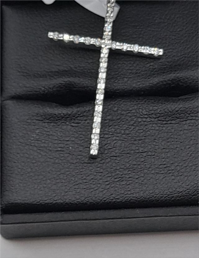 9ct white gold diamond cross pendant with sparkling diamonds, weighs 2.1g, featuring a detailed cross design.