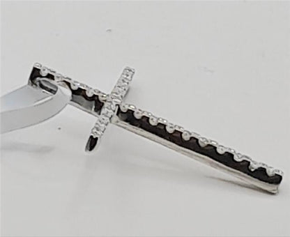 9ct white gold diamond cross pendant weighing 2.1g, featuring sparkling diamonds and a delicate chain design.