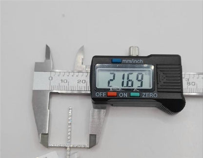 9ct white gold diamond cross pendant, unbranded, with sparkling diamonds and a sleek design, weighs 2.1g.