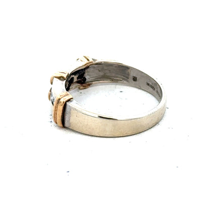 9ct white gold diamond ring showing a sleek band with a sparkling diamond centerpiece, elegant and sophisticated jewelry piece.