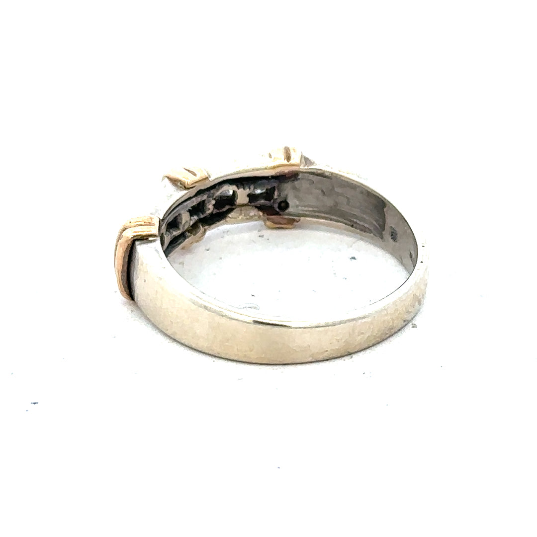 9ct white gold diamond ring with a central sparkling diamond, showcasing elegant craftsmanship and a sleek, modern design.