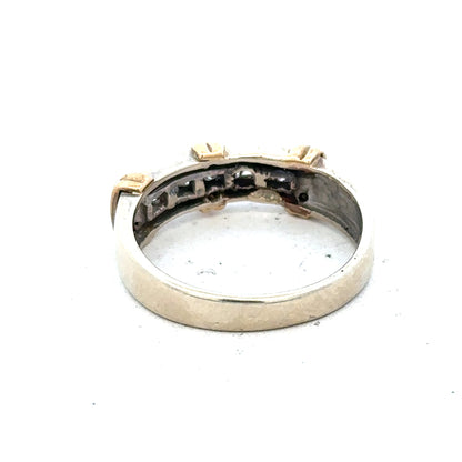 9ct white gold diamond ring featuring a sparkling central diamond and a sleek band, elegant jewelry for special occasions.