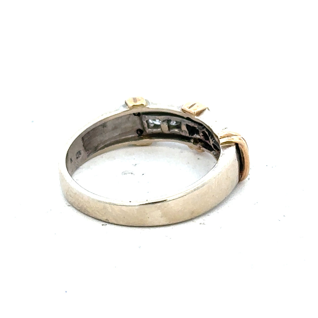 9ct white gold diamond ring featuring a central sparkling diamond and a sleek band design.