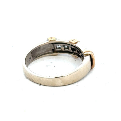 9ct white gold diamond ring featuring a central sparkling diamond and a sleek band design.