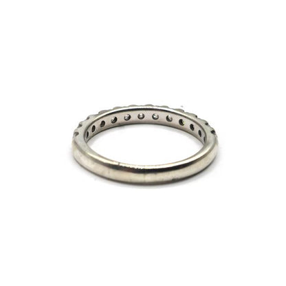 9ct white gold diamond ring with a central round-cut diamond, showcasing elegant craftsmanship and sparkling gemstones.