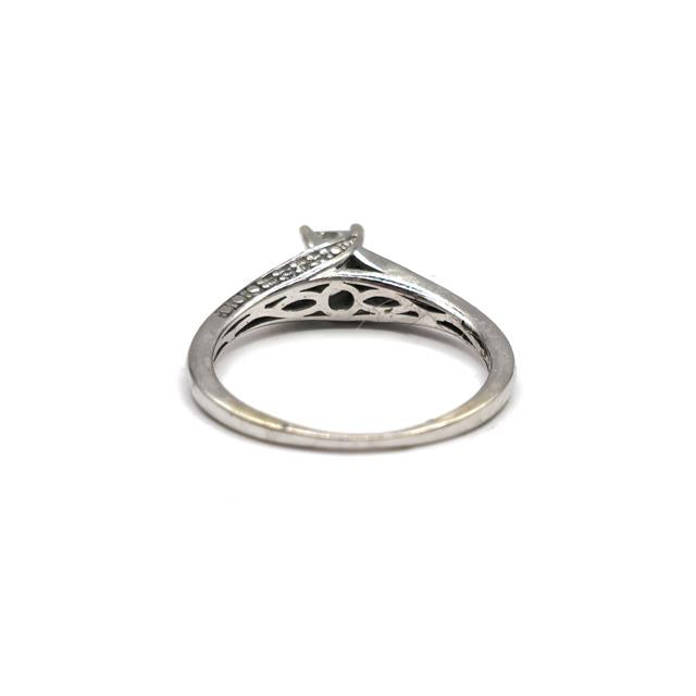 9ct white gold diamond ring with sparkling diamonds, showcasing elegant craftsmanship and a classic design.