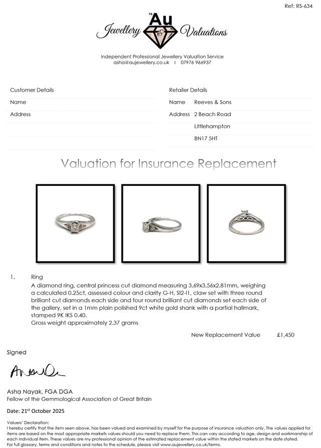 9ct white gold diamond ring with a central diamond and elegant design, displayed on a plain background.