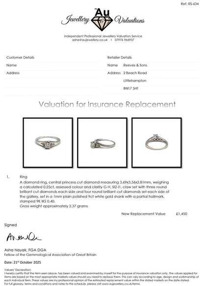 9ct white gold diamond ring with a central diamond and elegant design, displayed on a plain background.