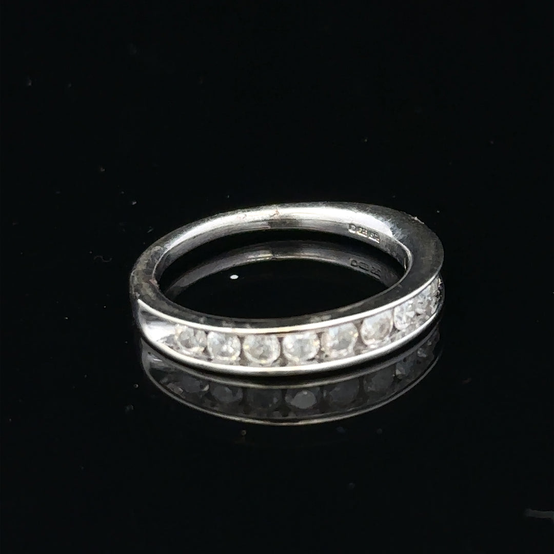 9ct white gold diamond ring in size J, featuring a sparkling central diamond and a sleek, elegant band.