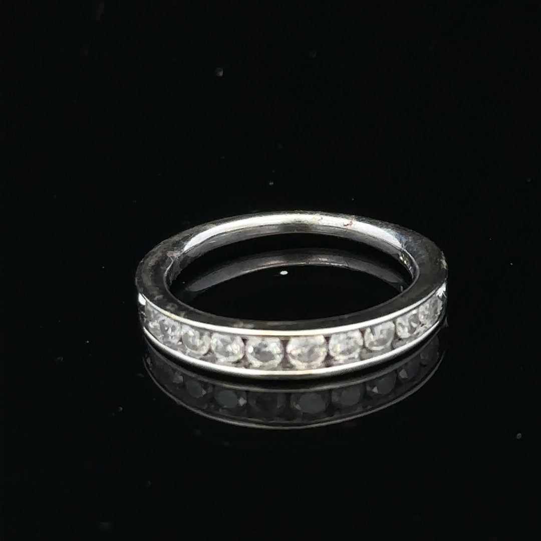 9ct white gold diamond ring in size J with sparkling diamonds, showcasing an elegant and classic jewelry design.