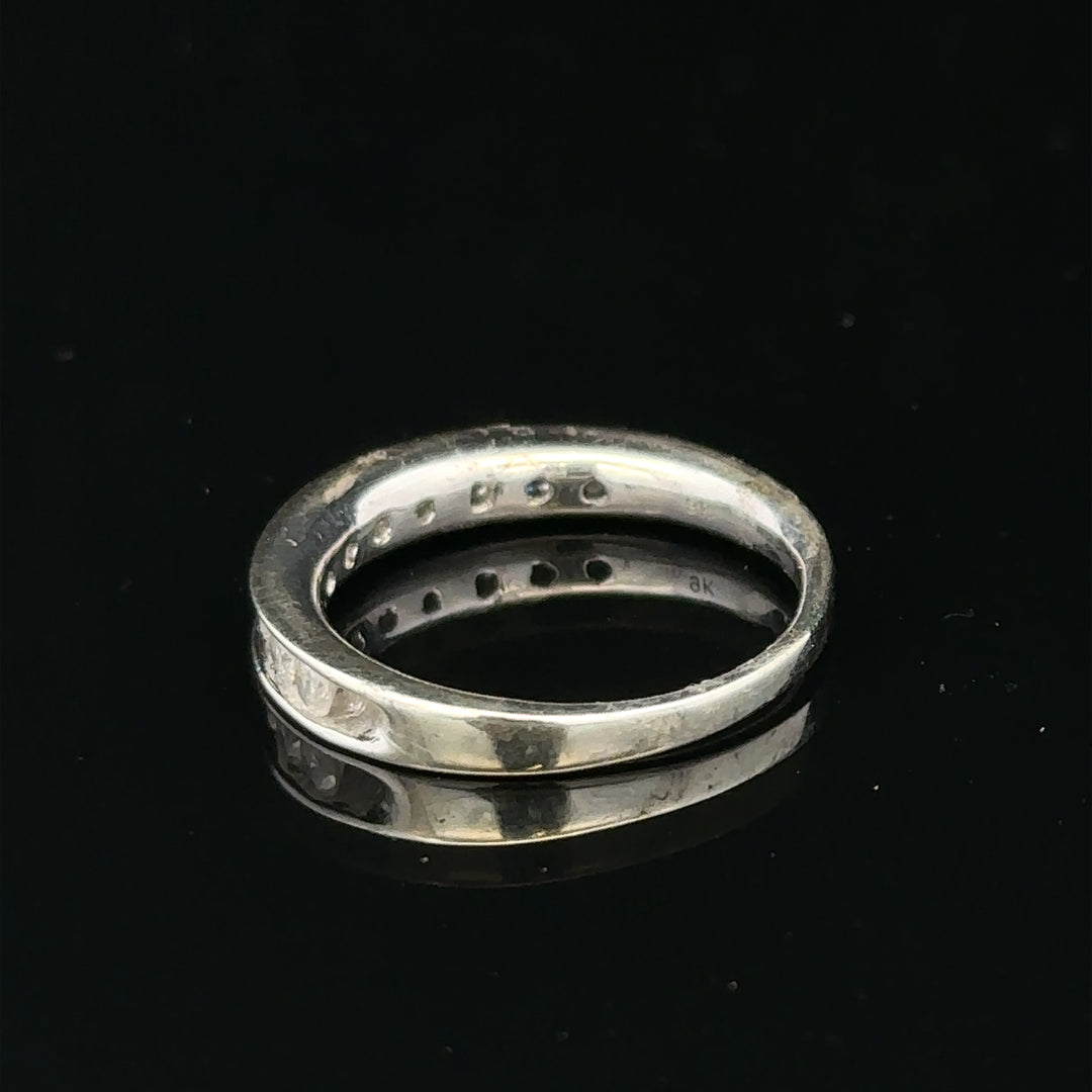 9ct white gold diamond ring in size J with a sparkling central diamond and delicate band design.