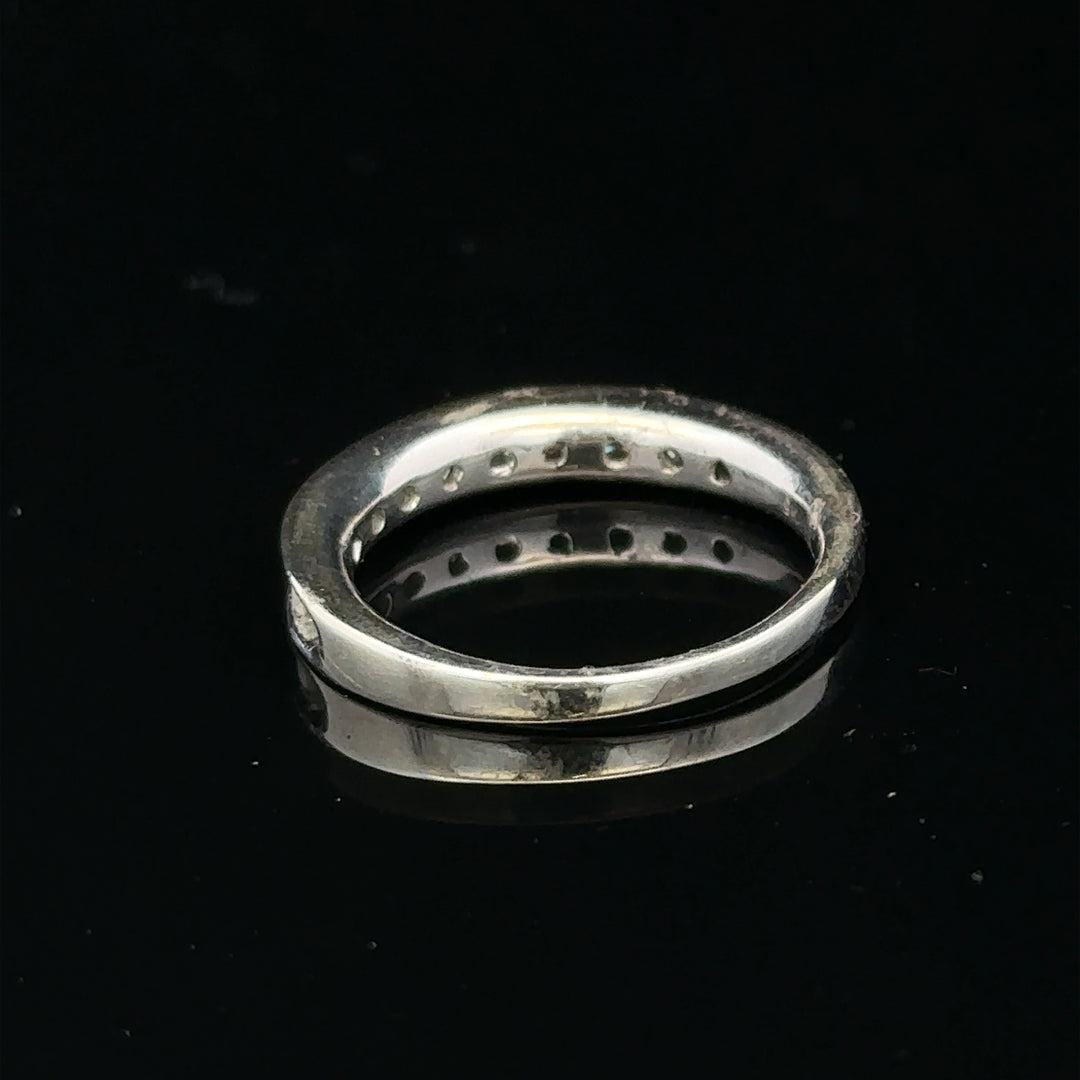 9ct white gold diamond ring in size J with sparkling diamonds, showcasing elegant jewelry craftsmanship.