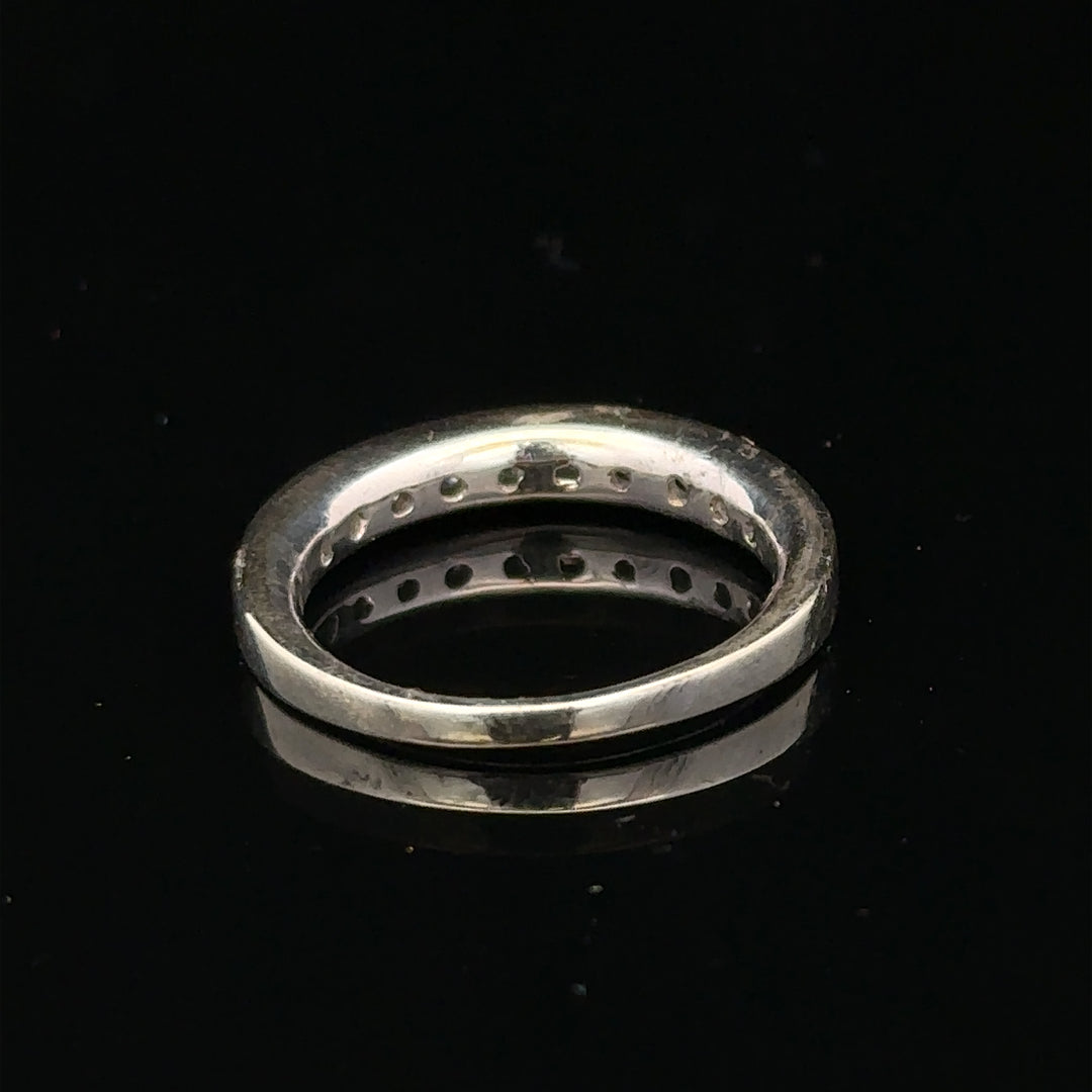 9ct white gold diamond ring size J with a sparkling central diamond and elegant band, unbranded jewelry piece.