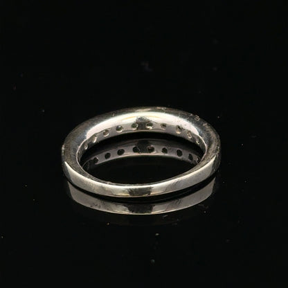 9ct white gold diamond ring size J with a sparkling central diamond and elegant band, unbranded jewelry piece.