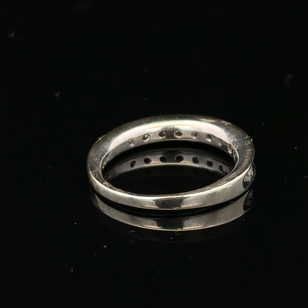 9ct white gold diamond ring in size J, featuring a sparkling central diamond and elegant design.