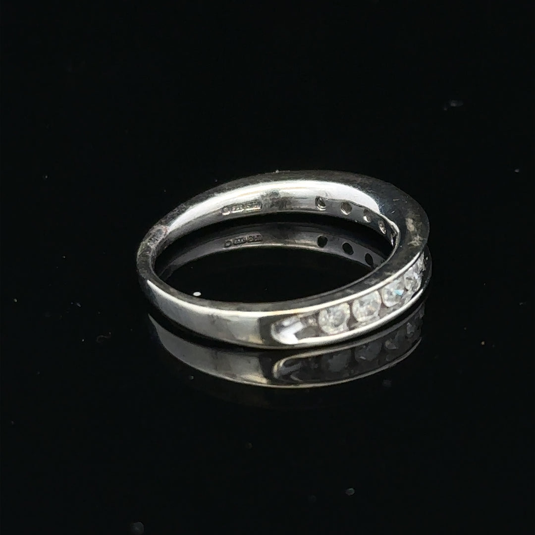9ct white gold diamond ring in size J with sparkling gemstone and sleek band, unbranded jewelry design.