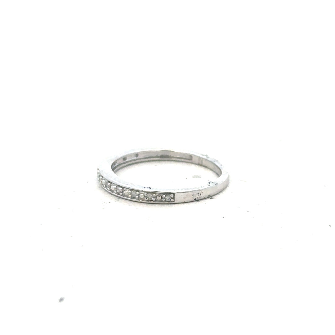 9ct white gold diamond ring size J1/2 with a sparkling central diamond and elegant band, unbranded jewelry image.
