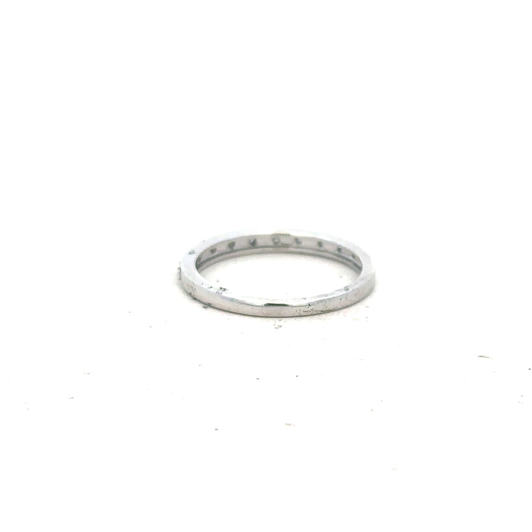 9ct white gold diamond ring in size J1/2, featuring sparkling diamonds and a sleek band design.